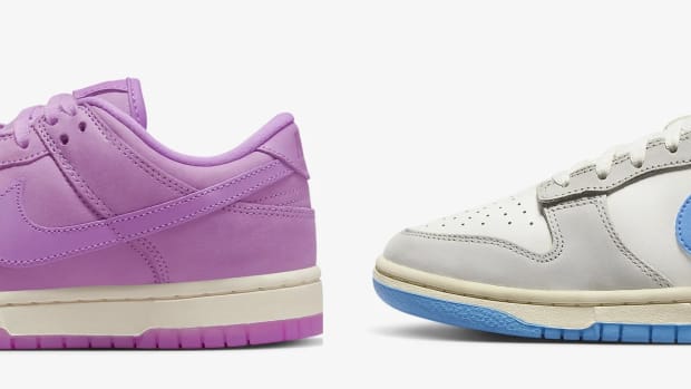 Side view of pink and blue Nike Dunk sneakers.